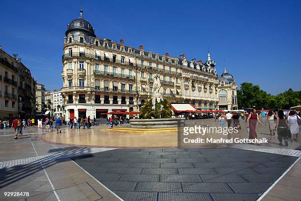 town square with fountain , montpellier , france - montpellier stock pictures, royalty-free photos & images