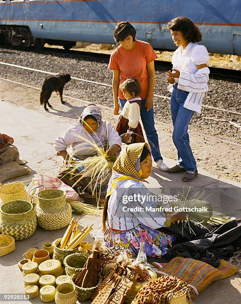 tarahumara women selling goods along the pacific railway in mexico - tarahumara stock pictures, royalty-free photos & images