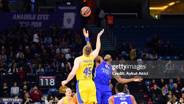 Bryant Dunston, #42 of Anadolu Efes Istanbul competes with Artsiom Parakhouski, #45 of Maccabi Fox Tel Aviv during the 2017/2018 Turkish Airlines...