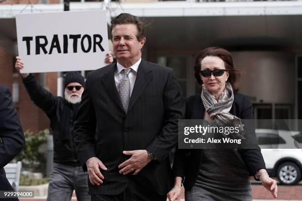 Former Trump campaign manager Paul Manafort arrives with his wife Kathleen Manafort at the Albert V. Bryan U.S. Courthouse for an arraignment hearing...