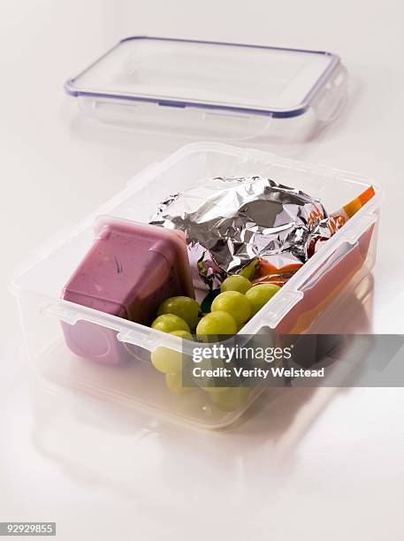 studio shot of packed lunch - yoghurt lid stock pictures, royalty-free photos & images