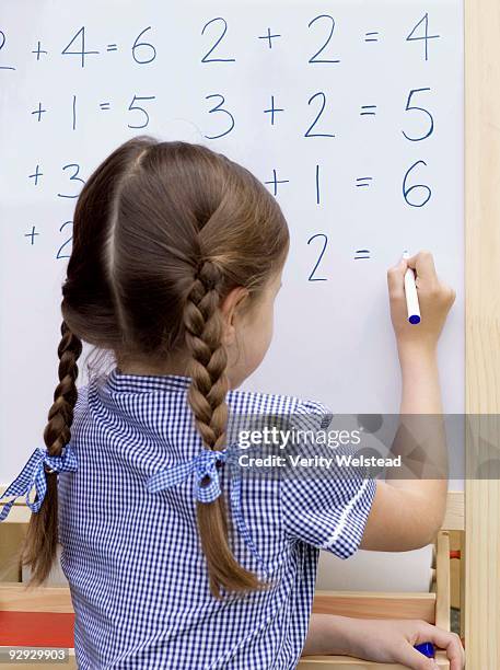 Doing Math Addition Rear Addition Photos and Premium High Res Pictures - Getty Images