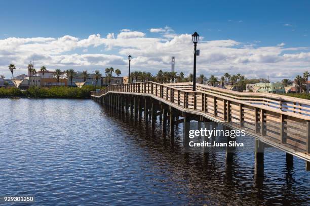 boardwalk at riverfront park, daytona beach, florida - daytona beach boardwalk stock pictures, royalty-free photos & images