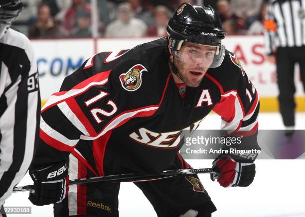 Mike Fisher of the Ottawa Senators prepares for a faceoff against the Atlanta Thrashers at Scotiabank Place on October 31, 2009 in Ottawa, Ontario,...