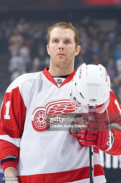 Daniel Cleary of the Detroit Red Wings stands for the anthems before a game against the Edmonton Oilers at Rexall Place on October 29, 2009 in...