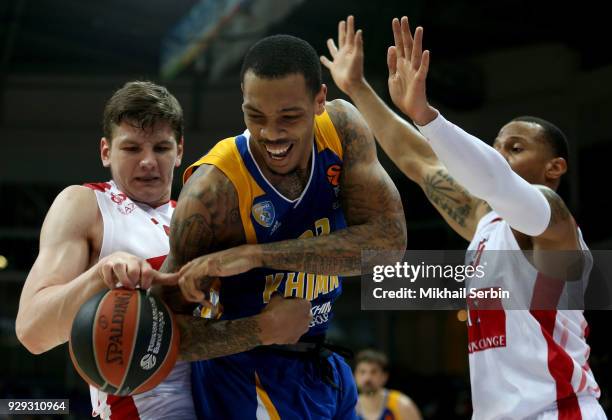 James Anderson, #21 of Khimki Moscow Region competes with Arturas Gudaitis, #77 of AX Armani Exchange Olimpia Milan in action during the 2017/2018...