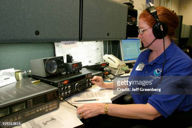 Volunteer ham radio operator communicating with those in path of Hurricane Ivan.
