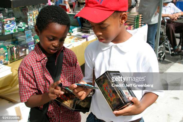 Two boys at the International Book Fair at Wolfson Campus.