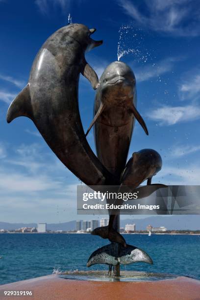 Friendship fountain of Dancing Dolphins on the Malecon Puerto Vallarta Mexico.