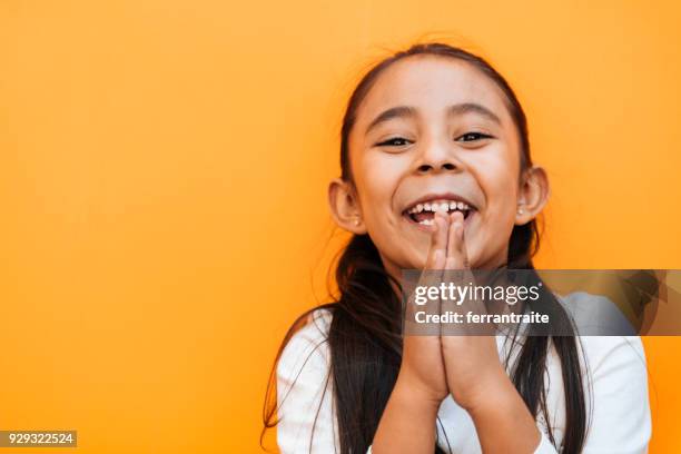 little girl facial expressions - pleading stock pictures, royalty-free photos & images