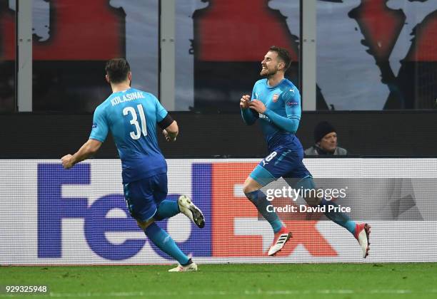 Aaron Ramsey celebrates scoring Arsenal's 2nd goal with Sead Kolasinac during UEFA Europa League Round of 16 match between AC Milan and Arsenal at...
