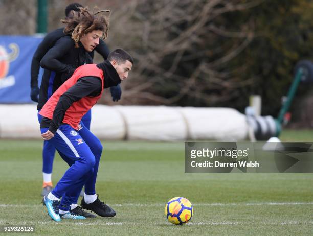 Ethan Ampadu and Eden Hazard of Chelsea during a training session at Chelsea Training Ground on March 8, 2018 in Cobham, England.