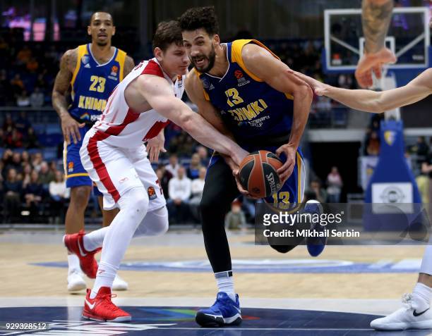 Anthony Gill, #13 of Khimki Moscow Region competes with Arturas Gudaitis, #77 of AX Armani Exchange Olimpia Milan in action during the 2017/2018...