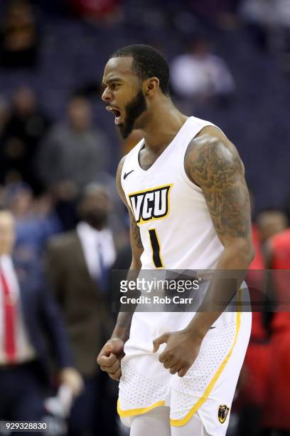 Mike'l Simms of the Virginia Commonwealth Rams celebrates during the closing moments of the Rams win over the Dayton Flyers during the second round...