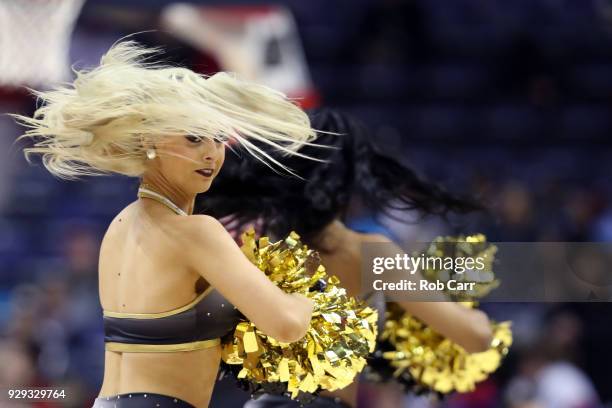 Virginia Commonwealth Rams cheerleaders perform during the second round of the Atlantic 10 Basketball Tournament between the Rams and Dayton Flyers...