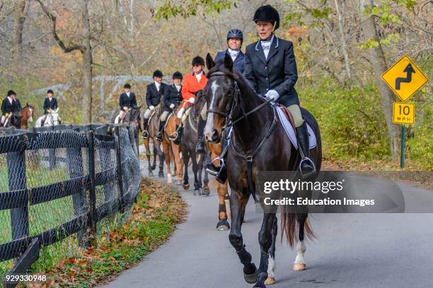 Huntsmen at the Annual Blessing of the Hounds at the Iroquois Hunt Club in Kentucky .