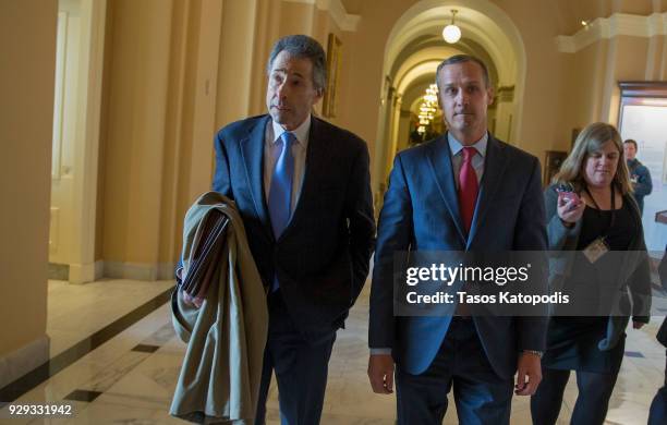 Former Trump campaign manager Corey Lewandowski is surrounded by members of the media as he leaves the House Permanent Select Committee on...