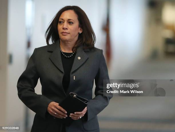 Sen. Kamala Harris, , walks to a closed door Senate Intelligence Committee meeting, on March 8, 2018 in Washington, DC. The committee is...