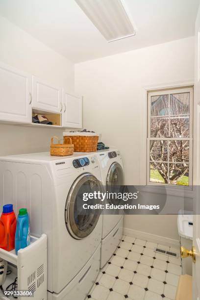 Laundry room interior of middle-class American home in Kentucky.