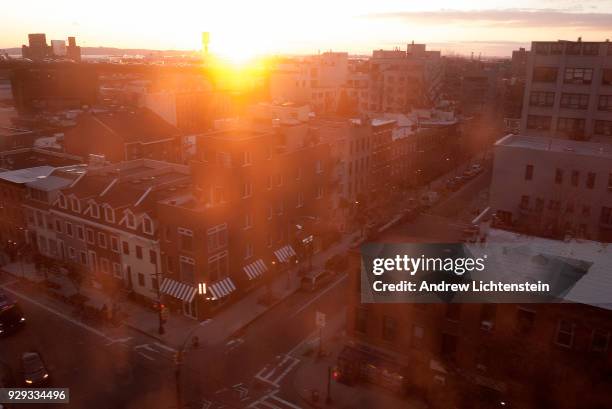 The sun sets over the Carroll Gardens neighborhood on February 8, 2018 in Brooklyn, New York.