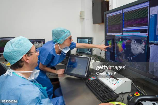 Radiofrequency ablation of cardiac arrhythmia using the Stereotaxis robotic system, by inserting a catheter into the heart, emitting radio waves that...