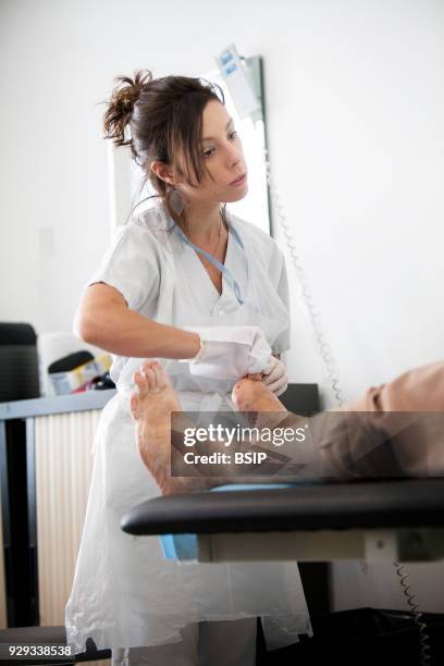 Diabetic feet consultations, Savoie, France, specialized team devoted to treatment and after-care for diabetic patients foot lesions. The nurse...