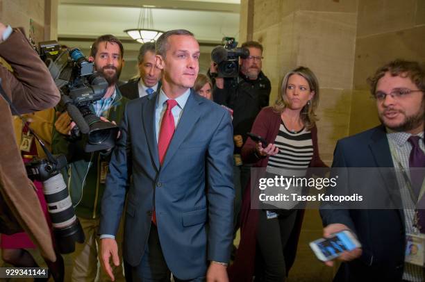 Former Trump campaign manager Corey Lewandowski is surrounded by members of the media as he leaves the House Permanent Select Committee on...