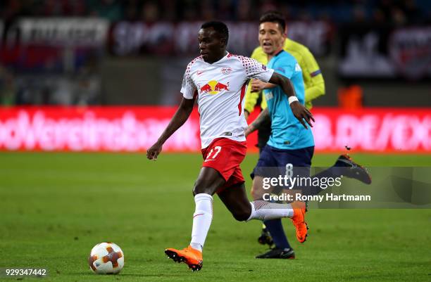 Bruma of RB Leipzig vies with Matas Kranevitter of FC Zenit Saint Petersburg during the UEFA Europa League Round of 16 match between RB Leipzig and...