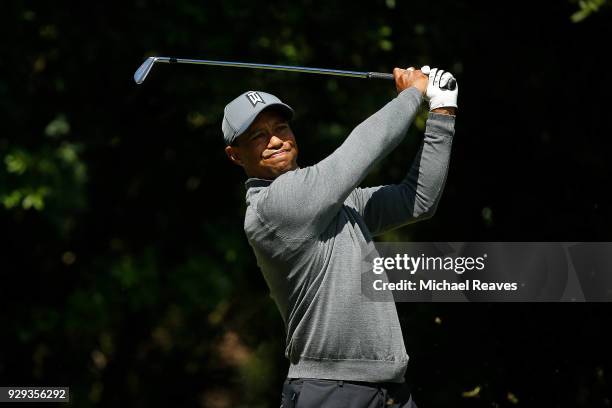 Tiger Woods plays his shot from the third tee during the first round of the Valspar Championship at Innisbrook Resort Copperhead Course on March 8,...