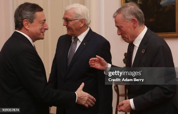 European Central Bank President Mario Draghi, German President Frank-Walter Steinmeier, and Former German President Horst Koehler attend a dinner in...