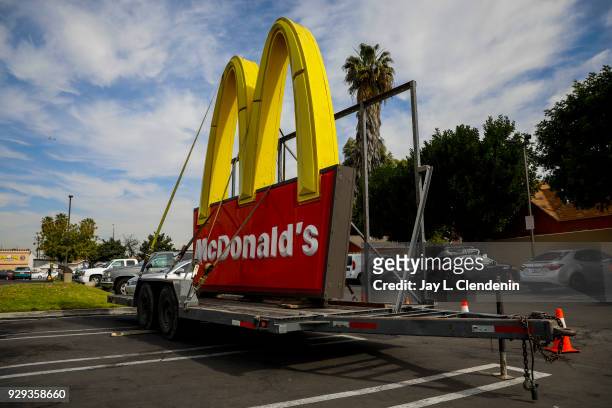 The usual McDonald's sign sits on a trailer in the parking lot of the franchise located at the corner of Long Beach Boulevard and Imperial Highway,...