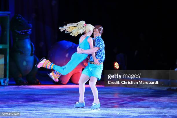 Actors dressed as Barbie and Ken perform on ice as they attend the Ice premiere 'Fantastische Abenteuer' at Velodrom on March 8, 2018 in Berlin,...