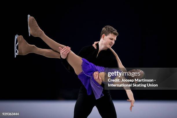 Audrey Lu and Misha Mitrofanov of the United States compete in the Pairs Free Skating during the World Junior Figure Skating Championships at Arena...