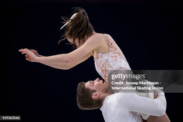Evelyn Walsh and Trennt Michaud of Canada compete in the Pairs Free Skating during the World Junior Figure Skating Championships at Arena Armeec on...