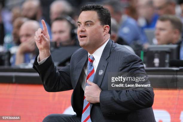 Head coach Sean Miller of the Arizona Wildcats directing his team against the Colorado Buffaloes during a quarterfinal game of the Pac-12 basketball...