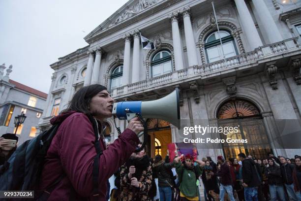Activist in front of Pacos do Municipio building during the Women's day march on March 8, 2018 in Lisbon, Portugal. International Women's Day is...