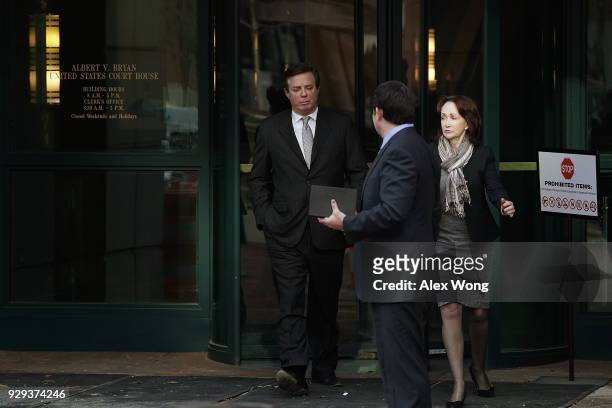 Former Trump campaign manager Paul Manafort leaves the Albert V. Bryan U.S. Courthouse with his wife Kathleen Manafort after an arraignment hearing...