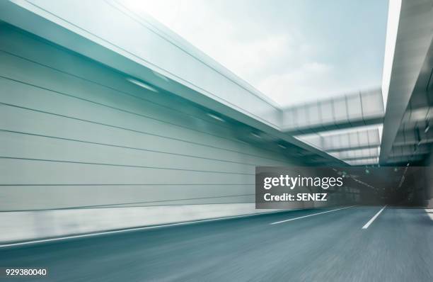 tunnel traffic - road motion stock pictures, royalty-free photos & images