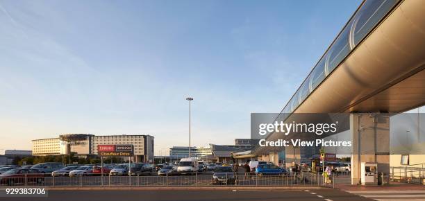 Skylink Walkway cross-over to airport building. Manchester Airport, Manchester, United Kingdom. Architect: n/a, 2015.