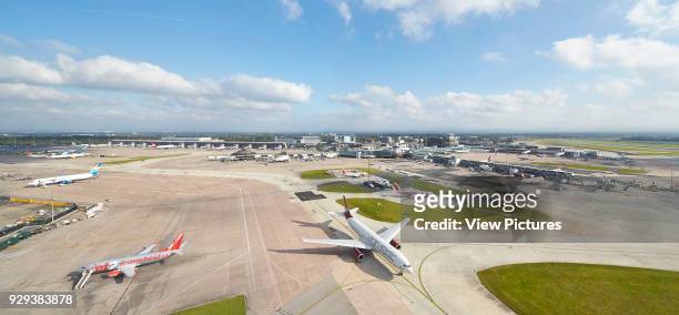 Overall elevated view of airport complex. Manchester Airport, Manchester, United Kingdom. Architect: n/a, 2015.