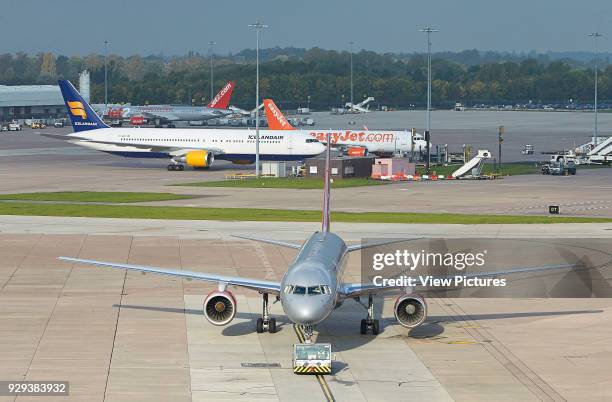 Taxiing the aircraft. Manchester Airport, Manchester, United Kingdom. Architect: n/a, 2015.