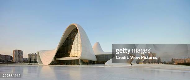 Heydar Alijev Cultural Centre, Baku, Azerbaijan. Architect: Zaha Hadid Architects, 2013. Grand panoramic view across plaza with undulating and...