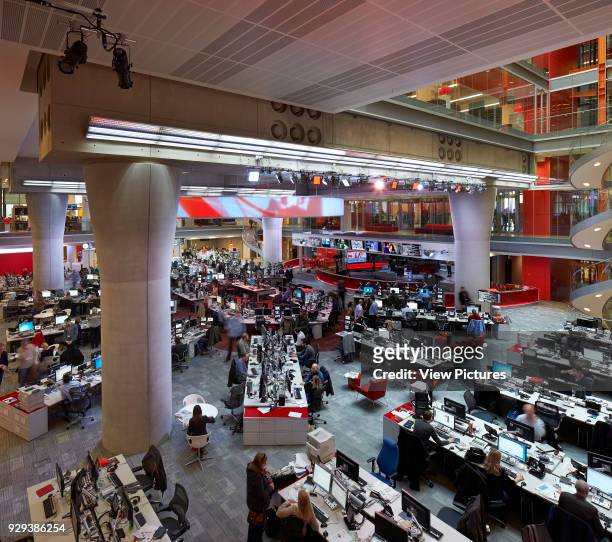 Broadcasting House, London, United Kingdom. Architect: HOK International Ltd, 2014. Elevated view to atrium with workstations.