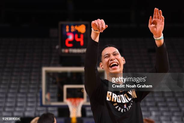 Jeremy Lin of the Brooklyn Nets warms up before the game against the Golden State Warriors on March 6, 2018 at ORACLE Arena in Oakland, California....