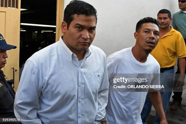 Roberto Castillo Mejia , the ninth suspect involved in the murder of Honduran activist Berta Caceres, is escorted as he leaves the criminal court in...