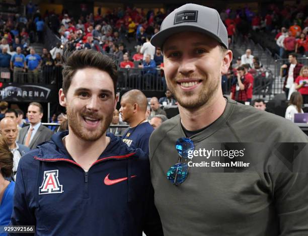 Former Arizona wide receiver David Douglas and his former teammate at Arizona, quarterback Nick Foles of the Philadelphia Eagles, attend a...