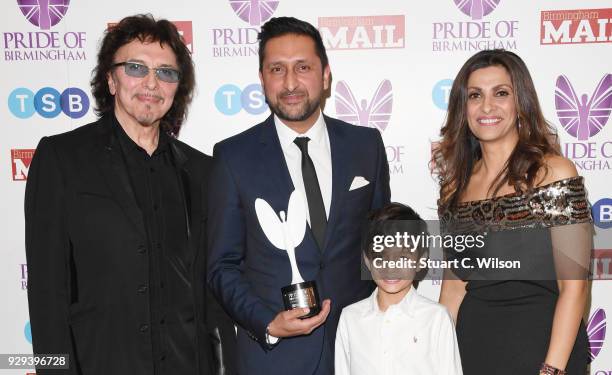 Outstanding Bravery award winner Harry Athwal poses with Tony Iommi and Sameena Ali-Khan in the winner's room at the Pride Of Birmingham Awards 2018...