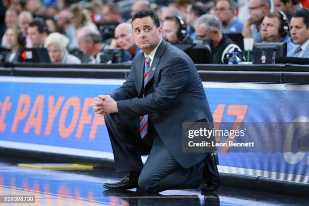 Head coach Sean Miller of the Arizona Wildcats directs his team against the Colorado Buffaloes during a quarterfinal game of the Pac-12 basketball...