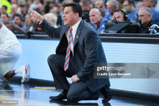 Head coach Sean Miller of the Arizona Wildcats directs his team against the Colorado Buffaloes during a quarterfinal game of the Pac-12 basketball...