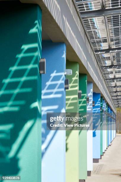 Color coded facade perspective with photovoltaic canopy. Battersea Dogs & Cats Home, London, United Kingdom. Architect: Jonathan Clark Architects,...